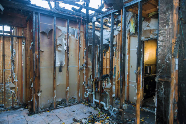 Professional Fire Damage Restoration technician working in Frederic, WI